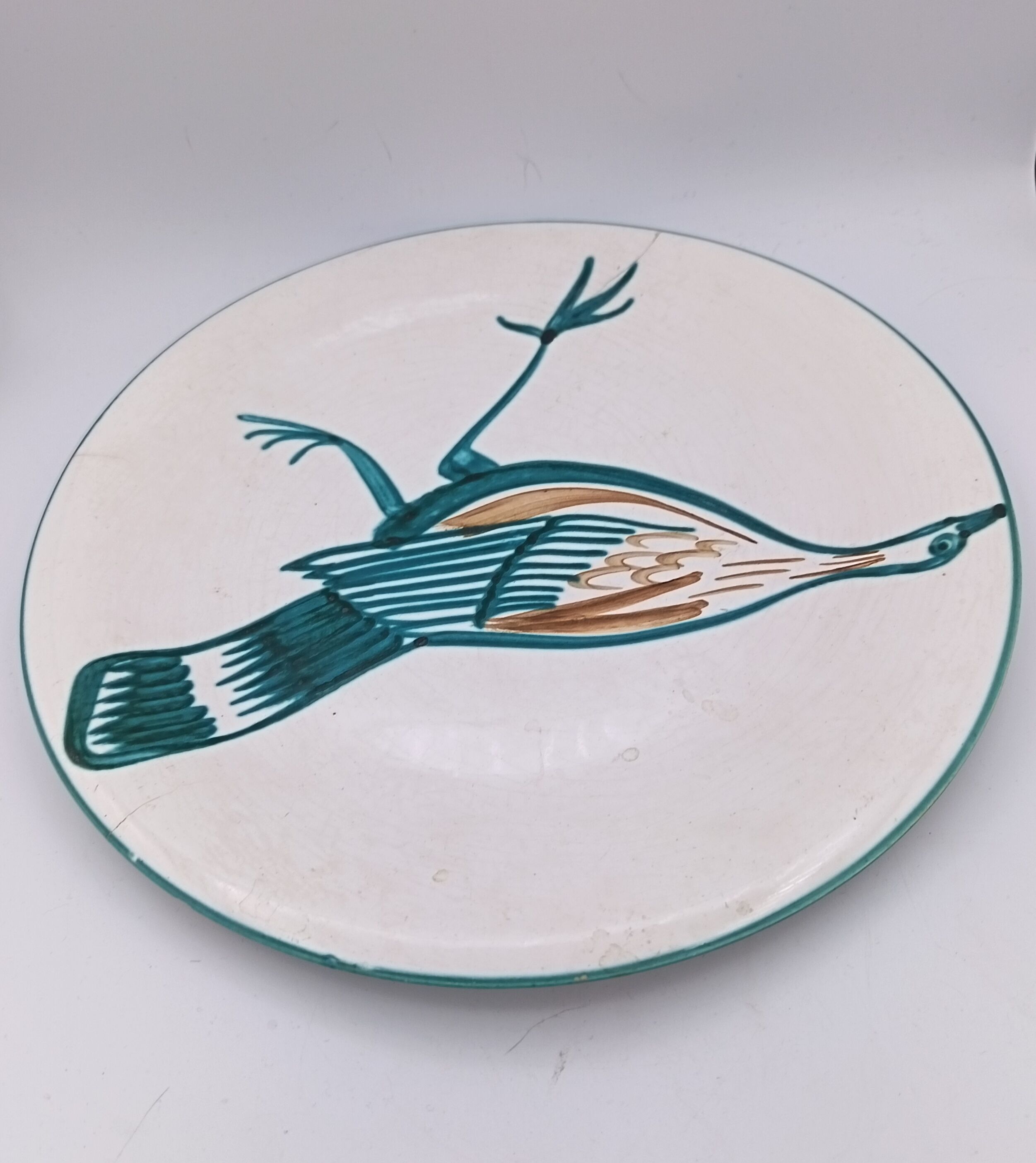 Large ceramic dish signed Roger Picault