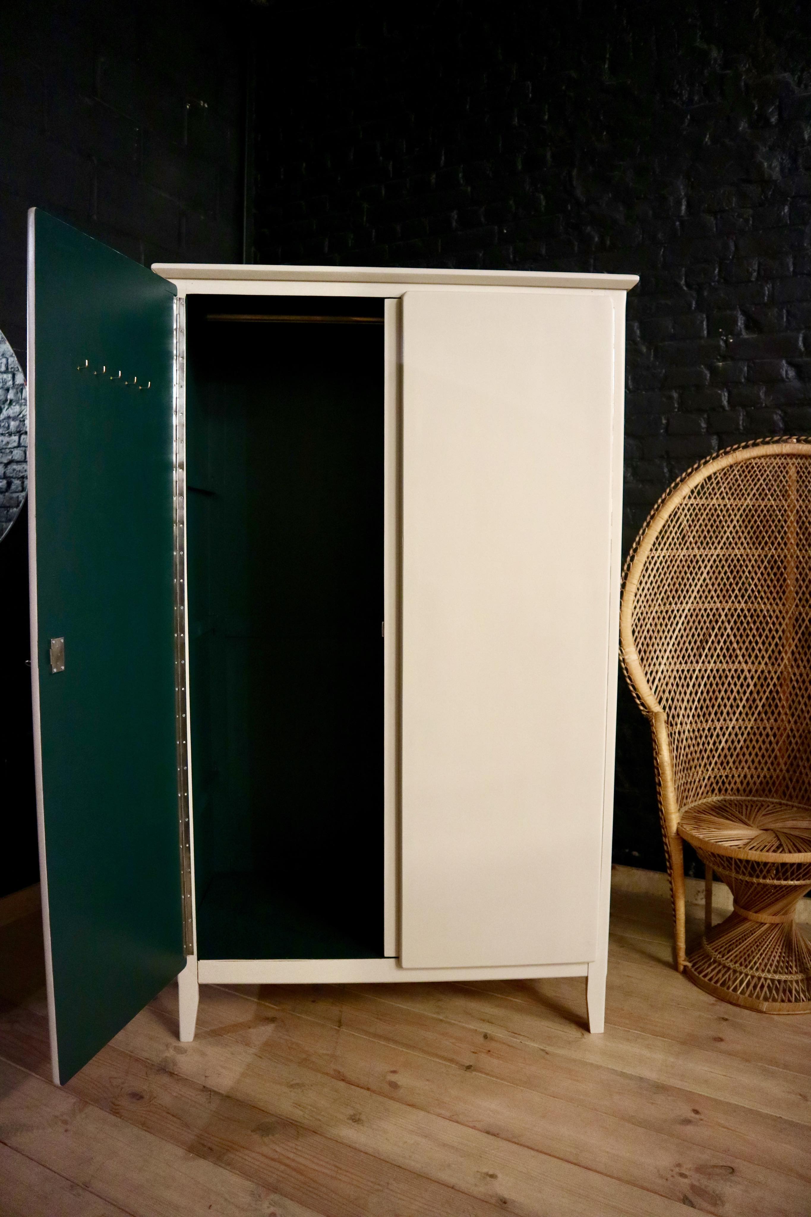 Restored parisian ivory, emerald green cabinet