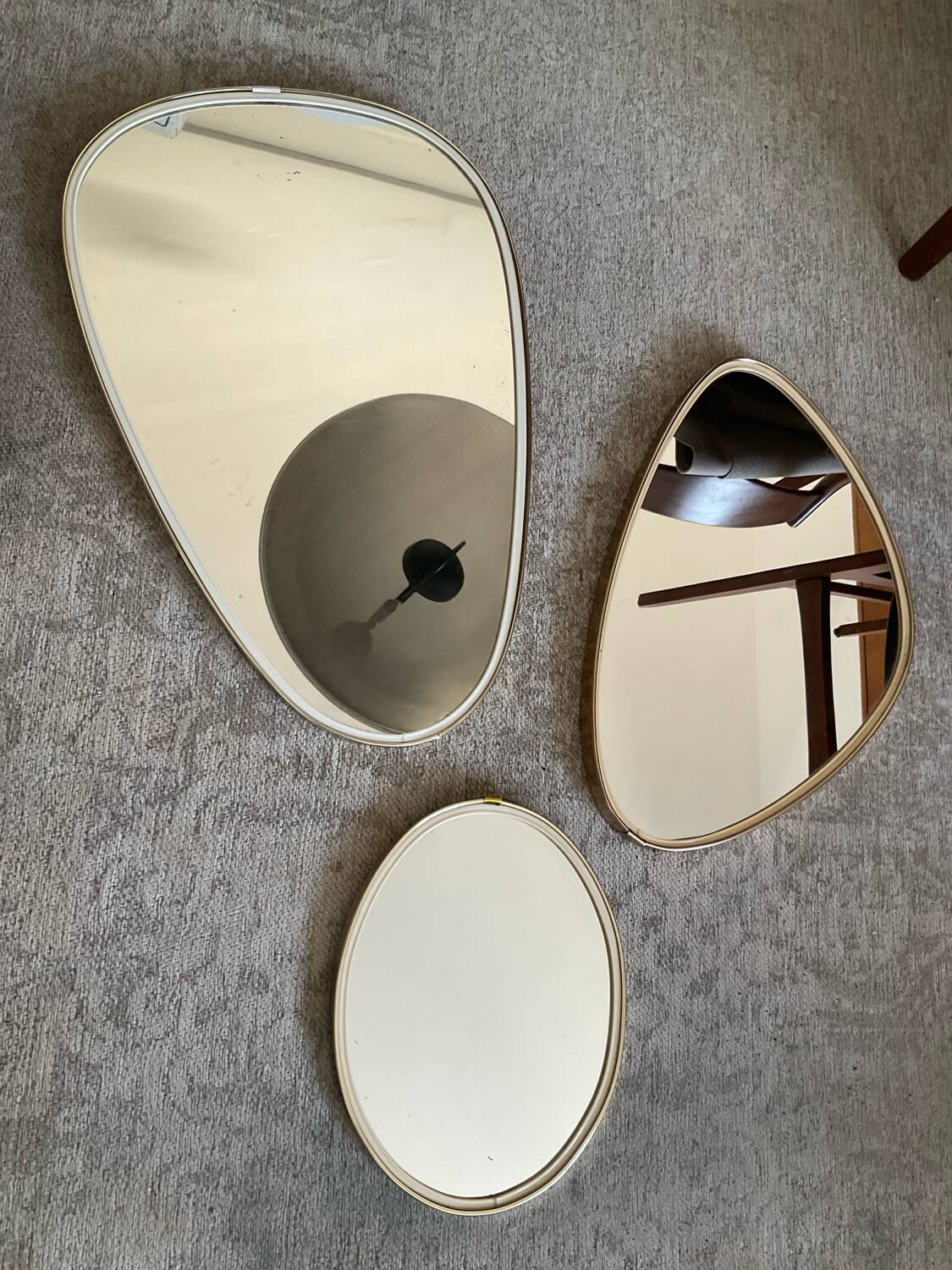 Trio of asymmetrical free-form mirrors from the 60s and 70s