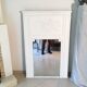 Fireplace trumeau mirror decorated with the attributes of music