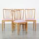 Set of four dining chairs from the 1970s with fabric seat and wooden frame
