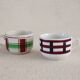 2 mismatched iron earth cups