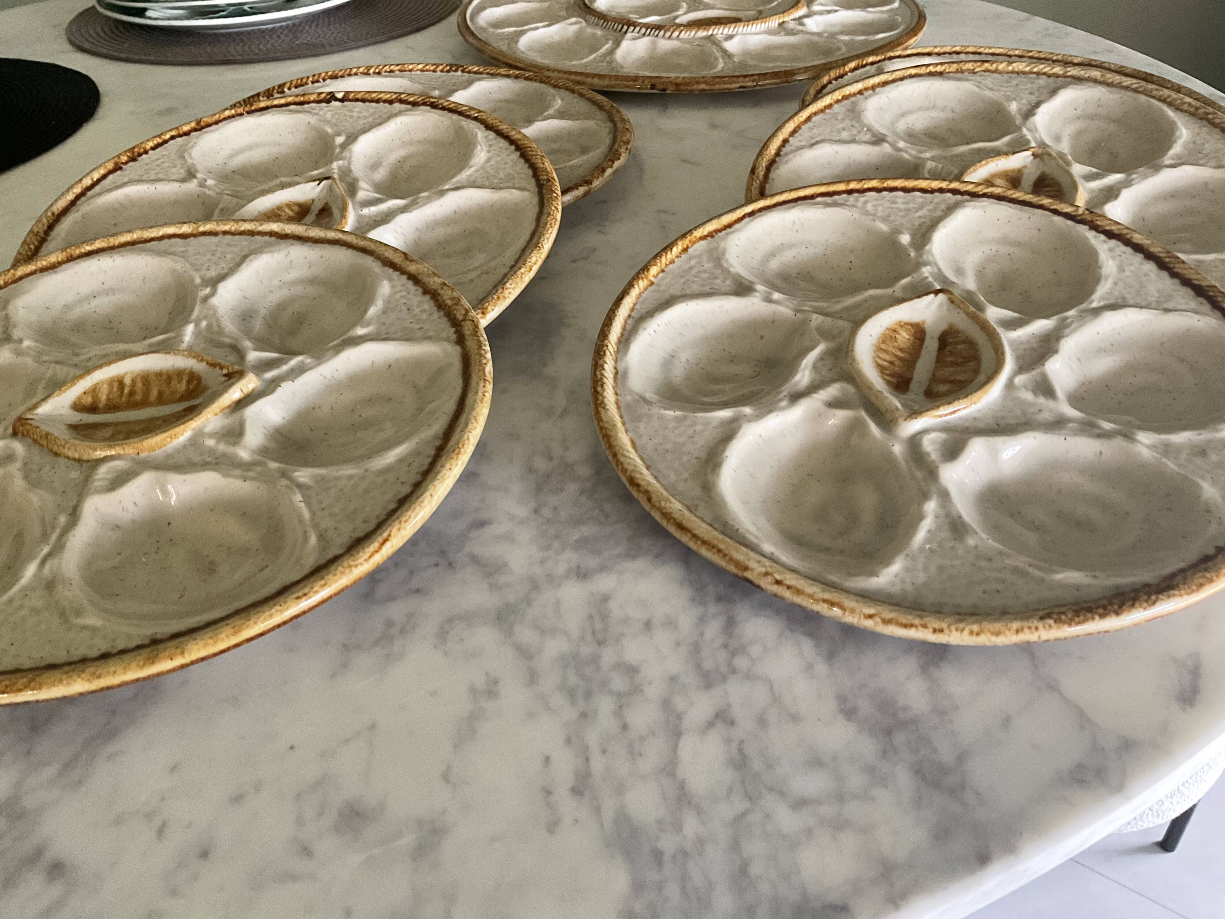 Set of 6 plates and 1 large oyster dish. Saint Clément.