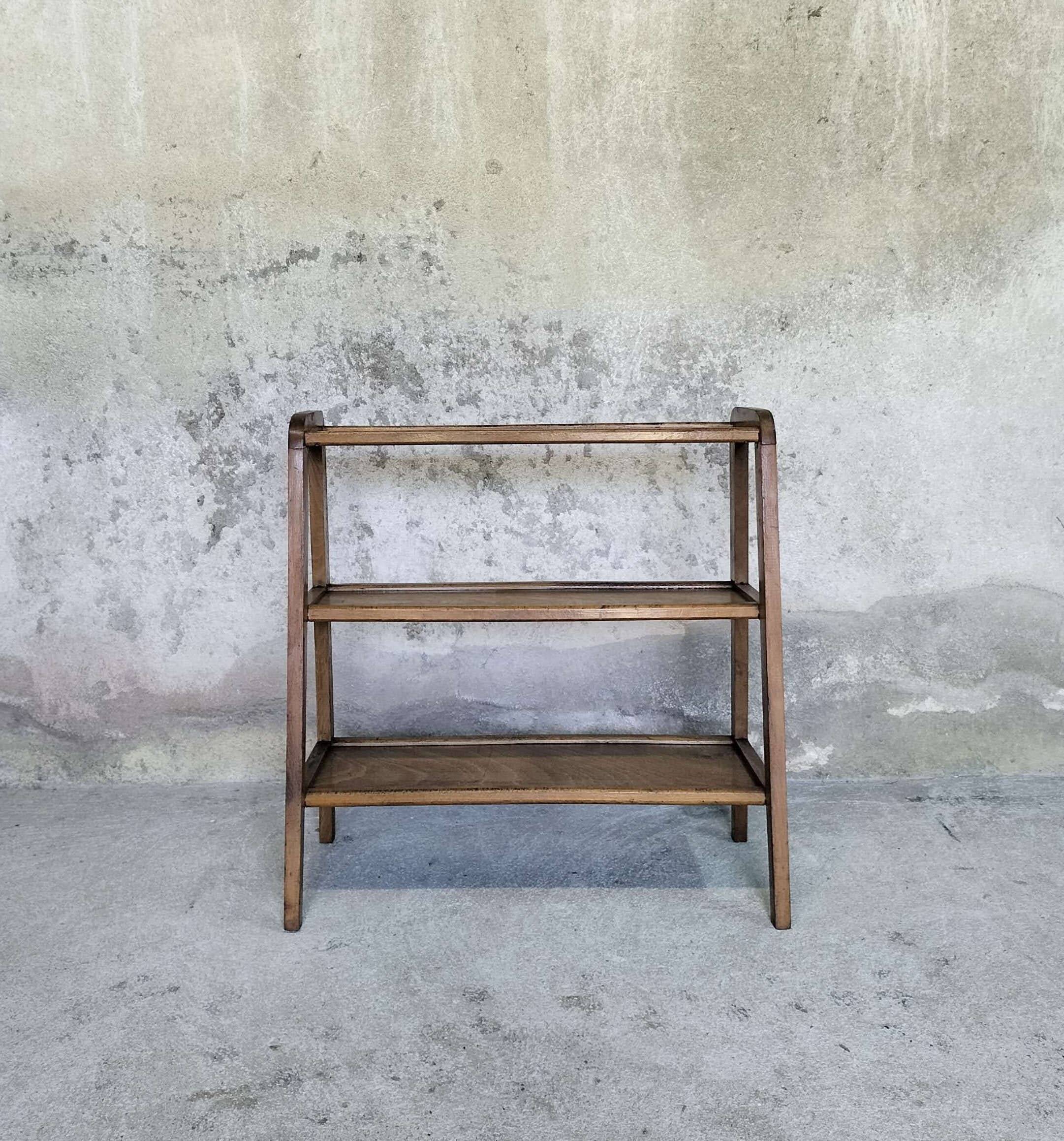 Vintage shelf on wooden legs in wood