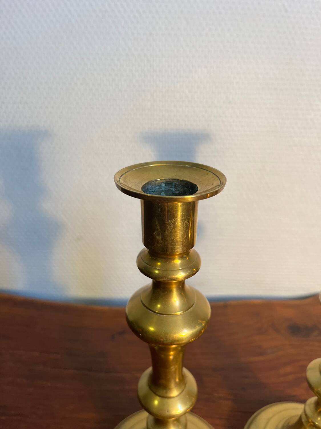 Pair of duo of ringed brass candlesticks