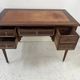 Louis XVI style desk in mahogany and mahogany veneer, 20th century.