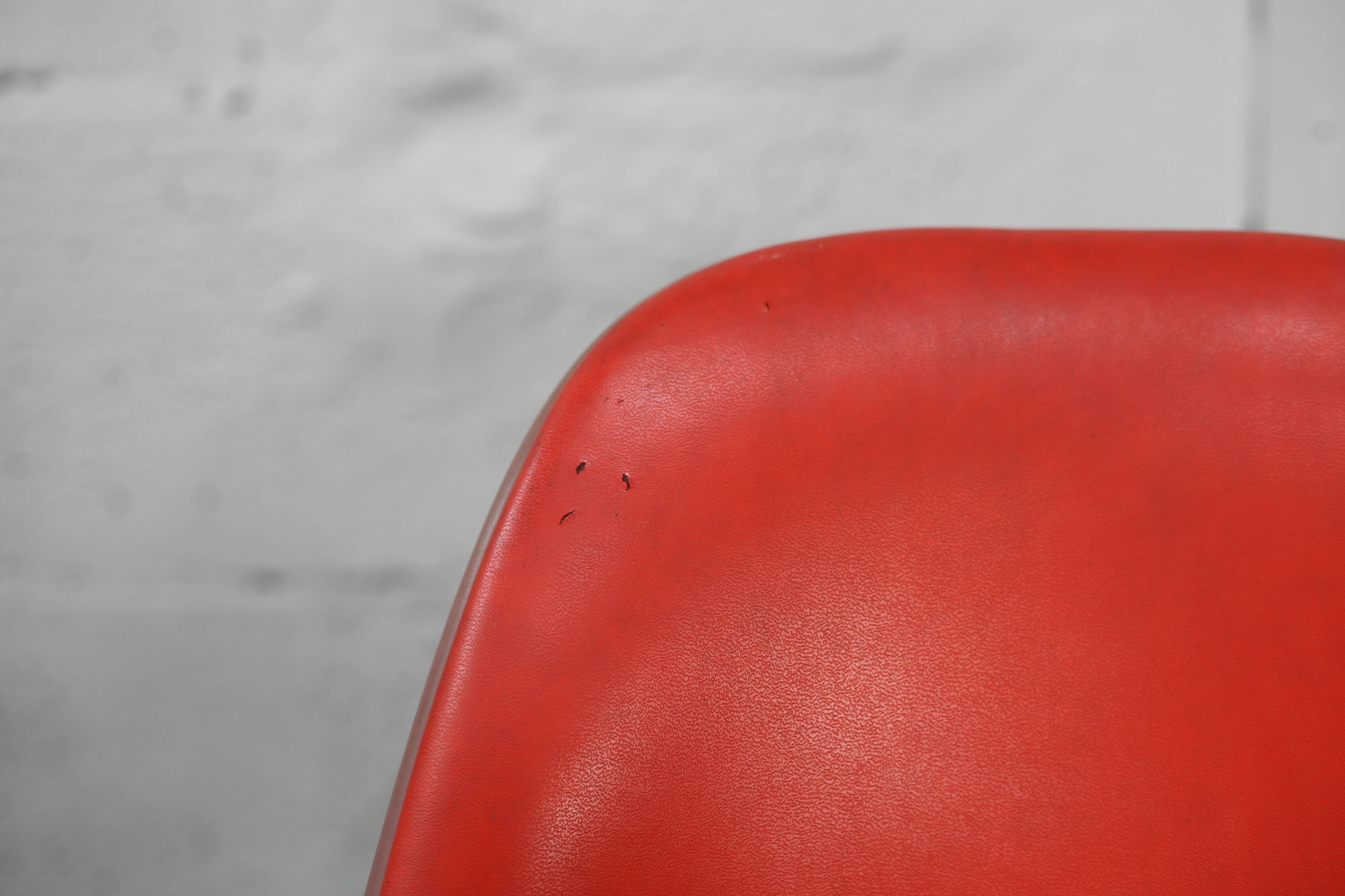 Ray & Charles Eames, Herman Miller edition, set of 4 orange chairs. Circa 1960
