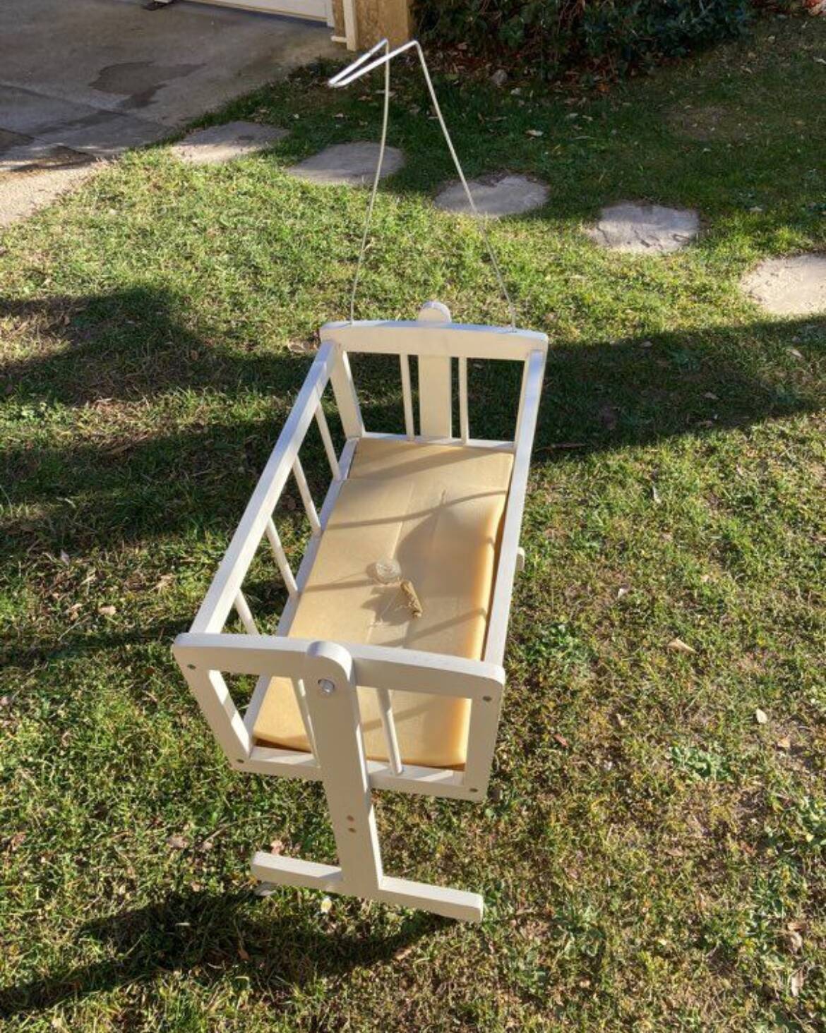 Complete wooden doll cradle on wheels