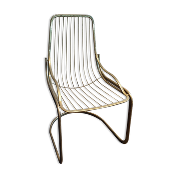 Chaise métallique tubulaire recouverte de dorure