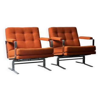 Pair of Karl Erik Ekselius armchair, in orange and chrome Kadrat fabric