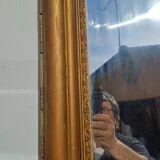19th century mirror in wood and gilded stucco "scallop shell"