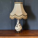 Porcelain lamp in the Indochinese style enhanced with gilding