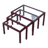 Nesting tables in burgundy lacquered metal and brass, France 1950s