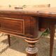 Louis XVI style table in rosewood with lemon tree inlay.