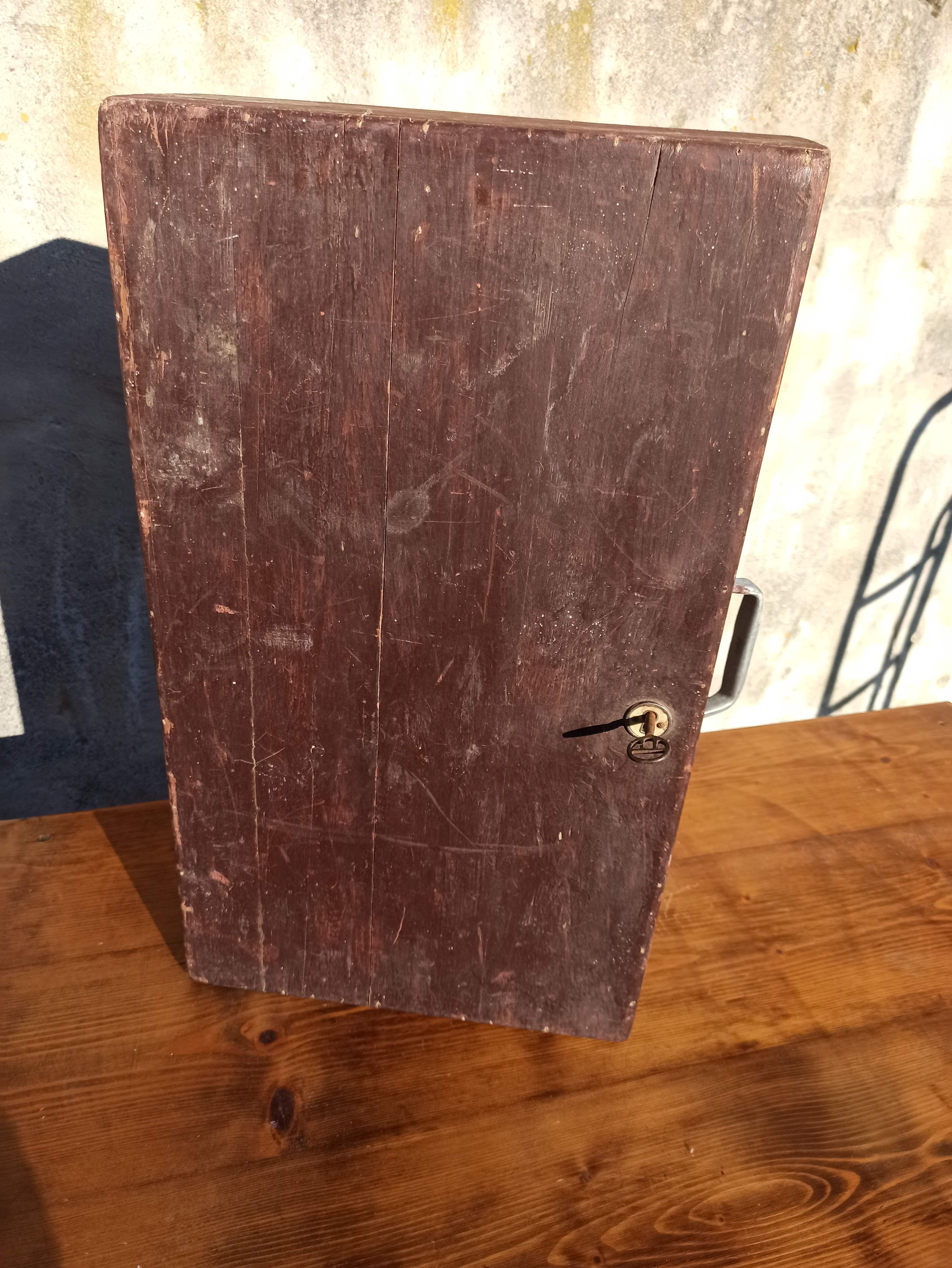Antique wooden suitcase with lock and key