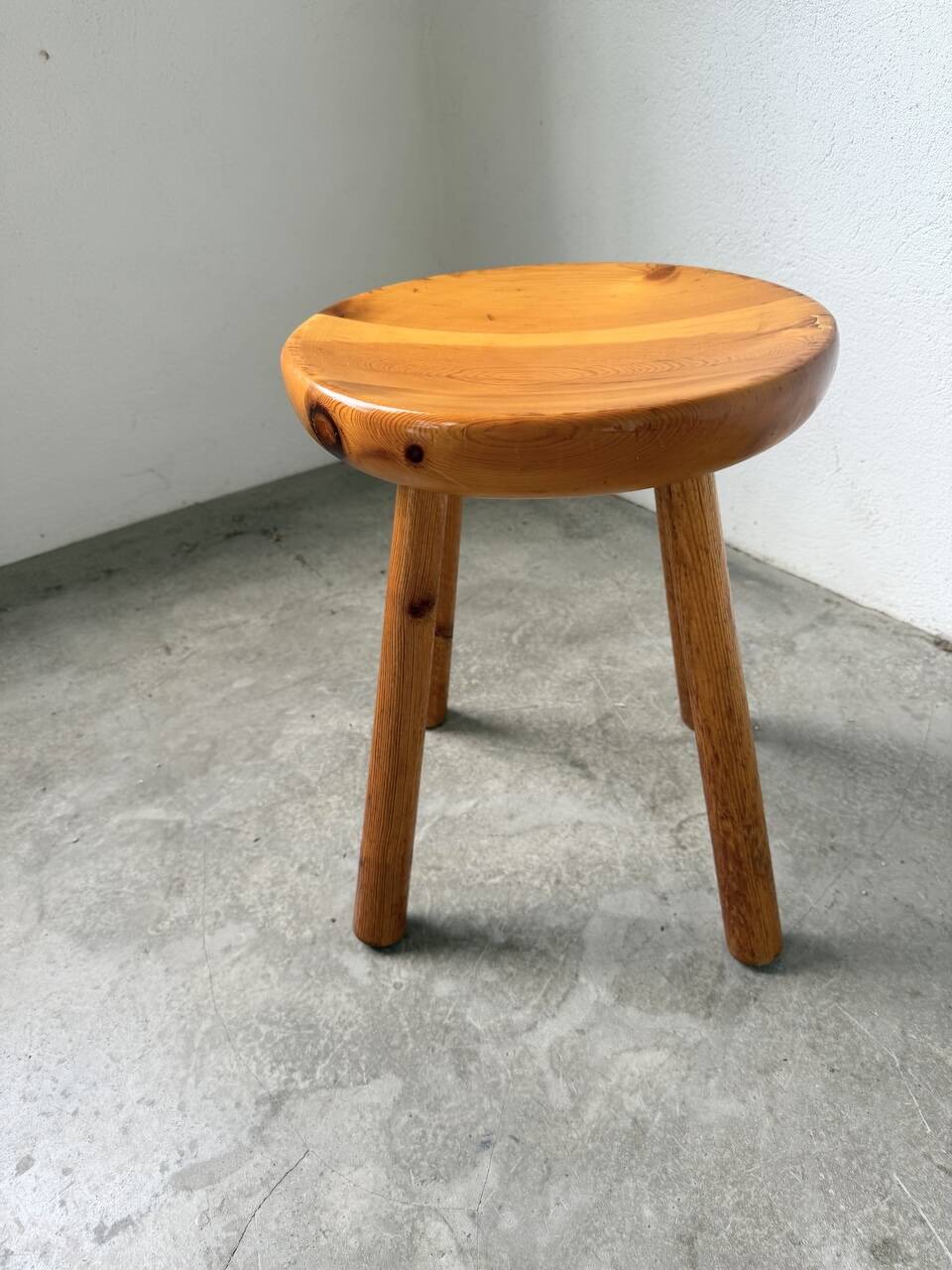 Pine stool assigned to Charlotte Perriand for Les Arcs.