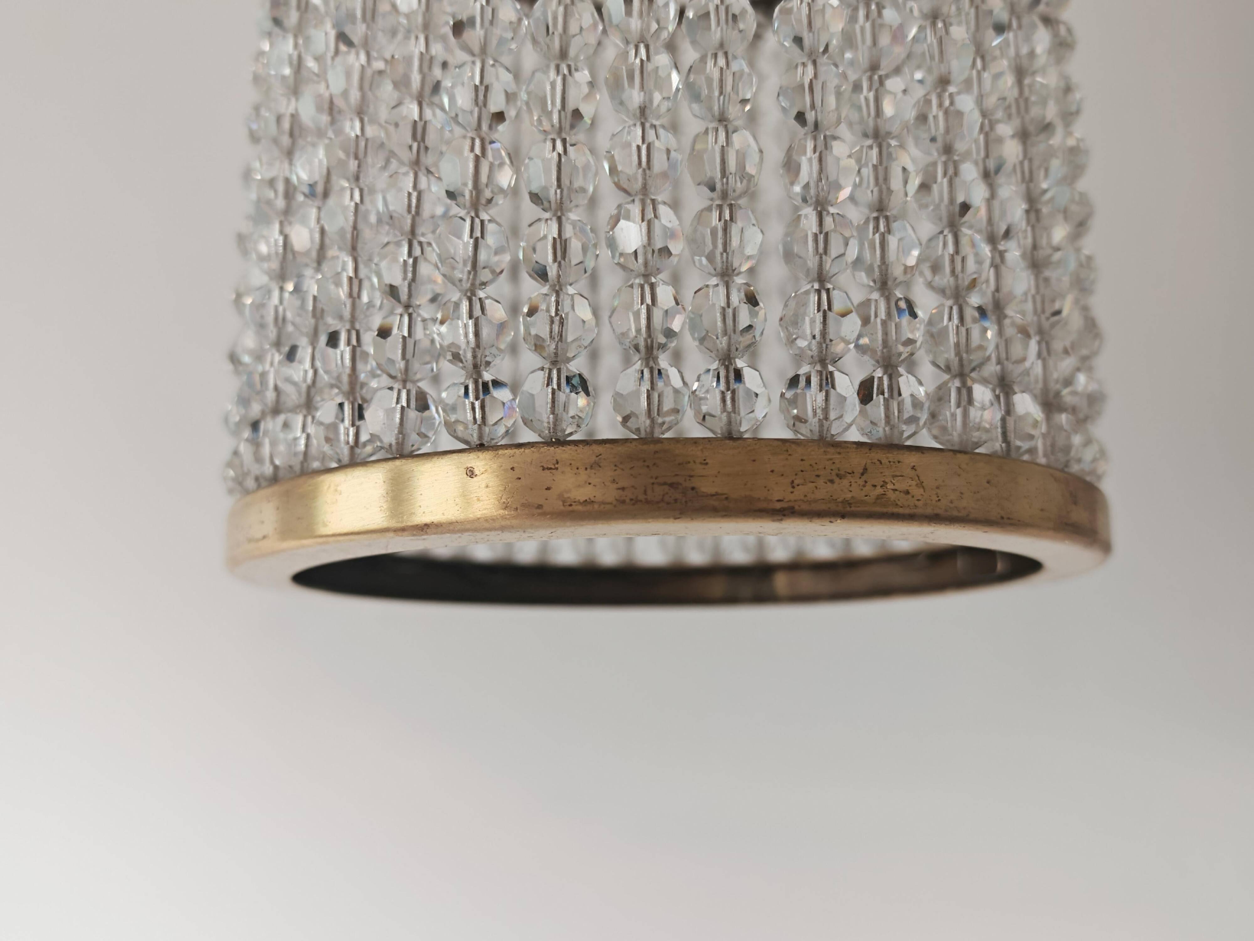Set of 3 cylindrical crystal chandeliers in mid-century modern style attributed to Lobmeyr.