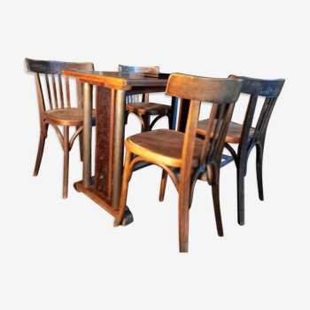 Old bistro table and its 4 chairs