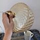 Gold-plated glass pendant light with diamonds