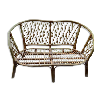 Old wicker rattan armchair