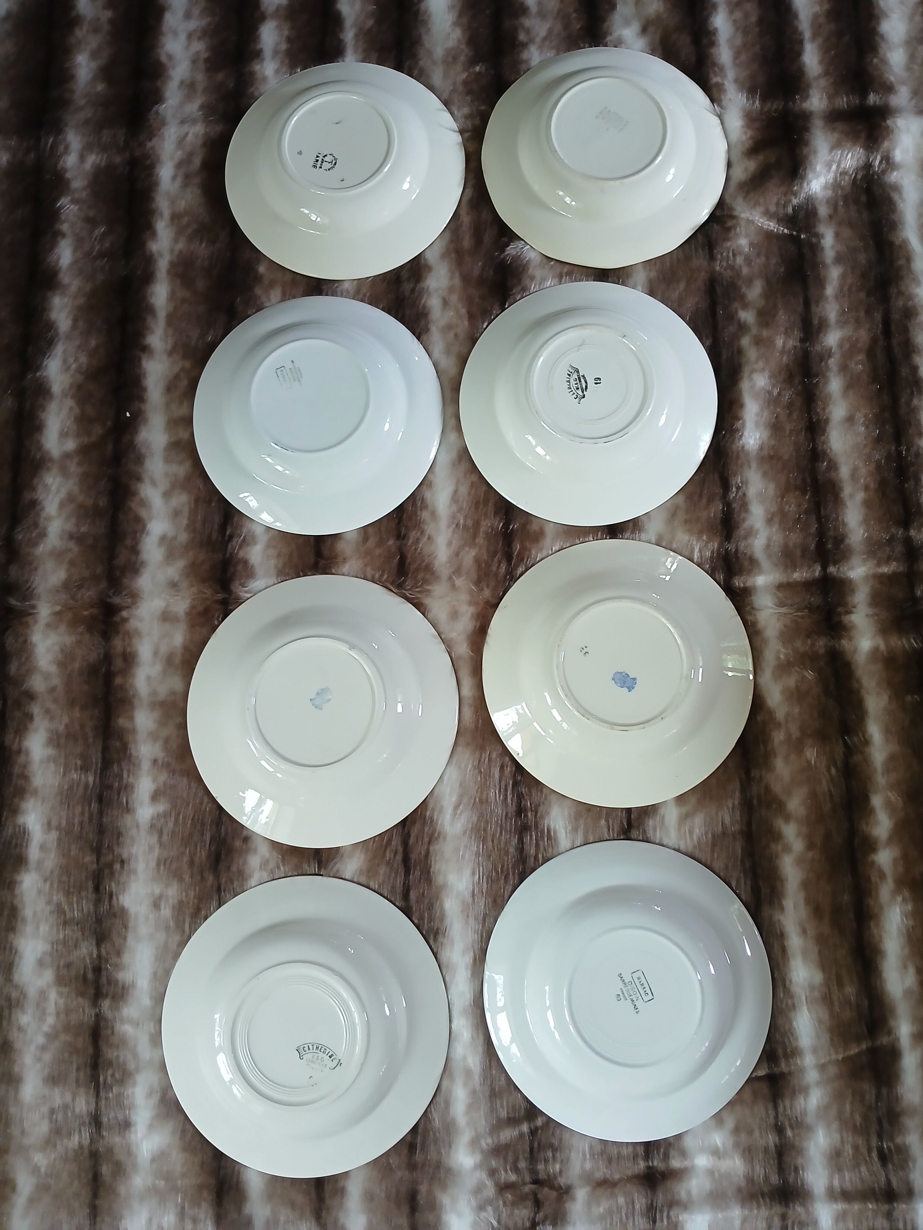 8 mismatched antique deep plates