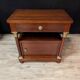 Pair of Empire style bedside tables in mahogany and gilded bronze