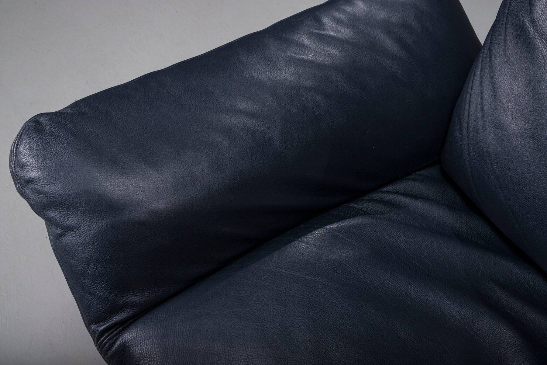 Danish teak and navy blue leather 2-seater sofa from Komfort, 1970s