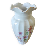 Porcelain vase with floral decoration and gold trim.