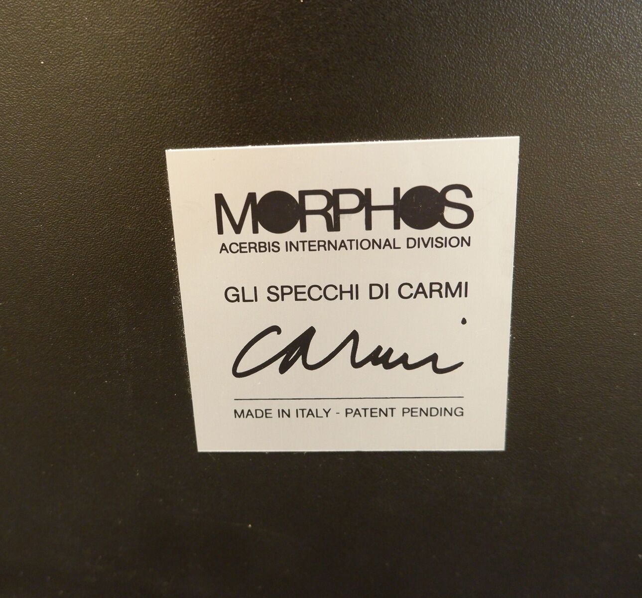 Wall mirror by Eugenio Carmi for the Morphos collection, Acerbis International. - 80s 44x110cm