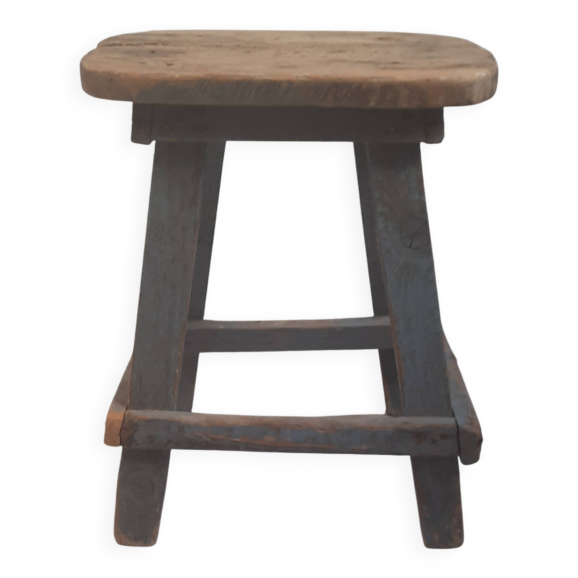 Antique wooden stool in the brutalist style