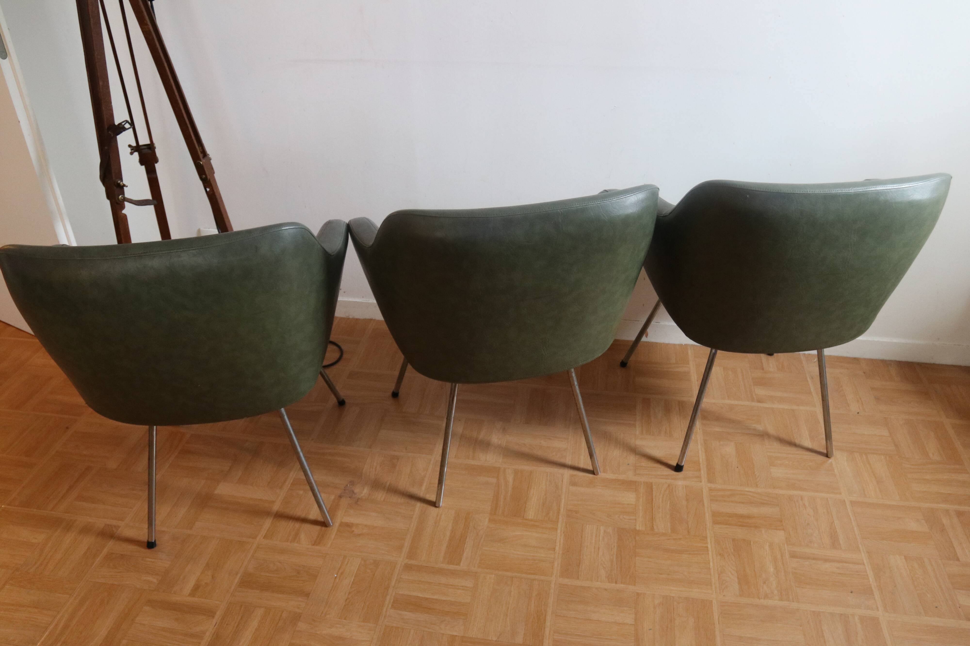 Lot of three armchair in green skai with chrome feet