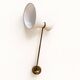 Extendable wall light in the style of Maison Lunel.