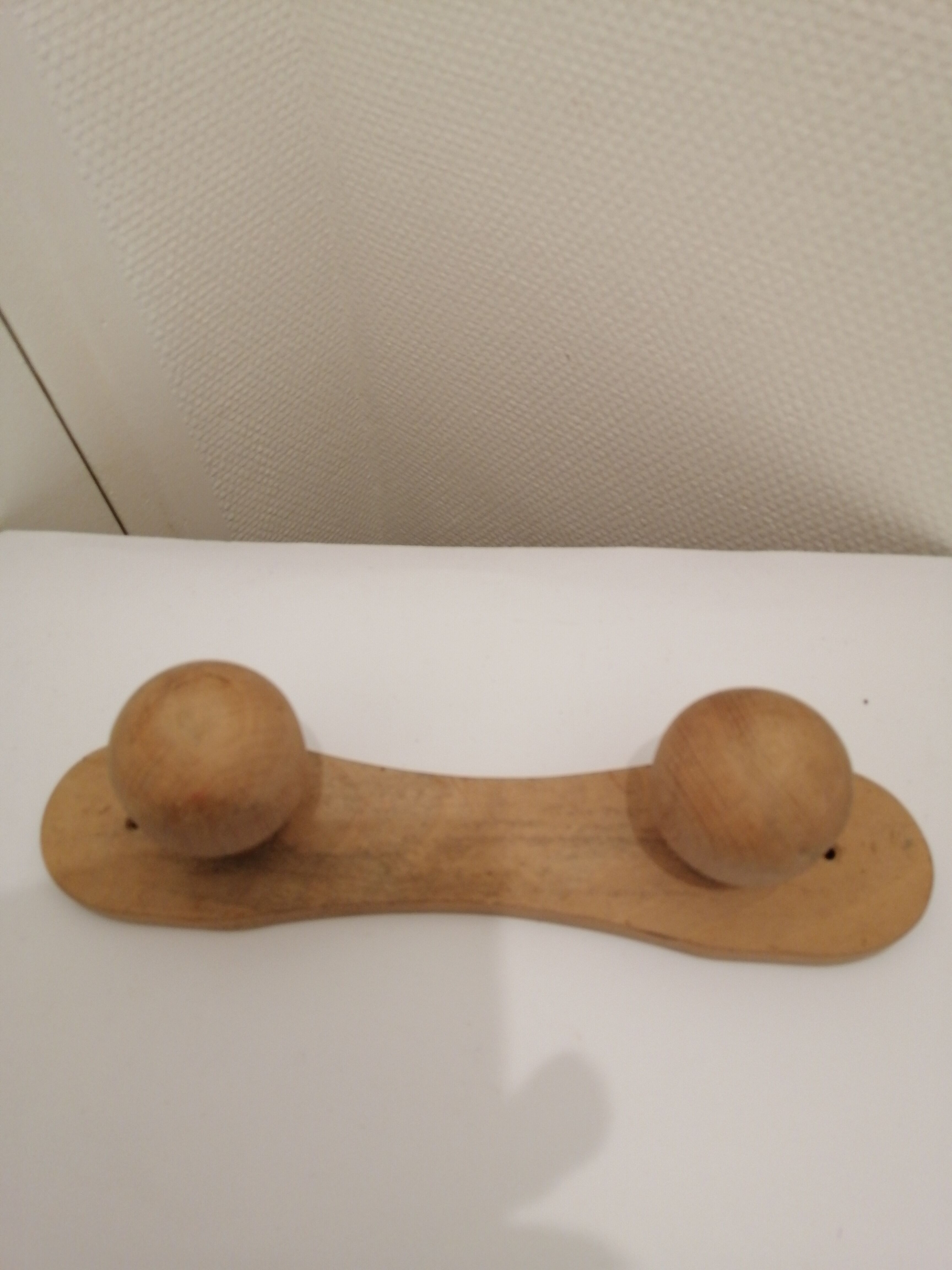 Wooden wall coat rack