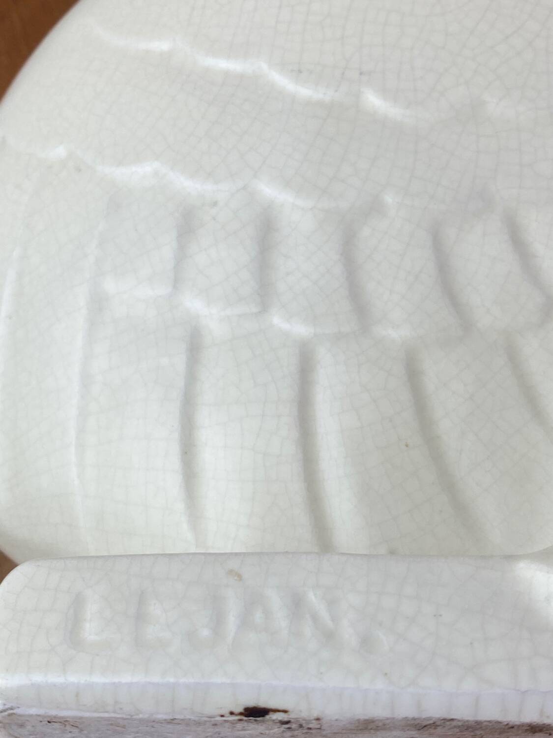 Cracked ceramic doves, signed Lejan