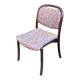 Scandinavian chair in curved solid teak wood and fabric.
