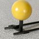Vintage wall coat rack, metal and wood in yellow and red.