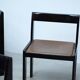 Set of eight black lacquered dining chairs