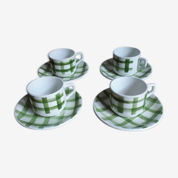 Set of 4 coffee cups with their sub-cups