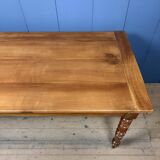 Antique cherry wood dining table from France.