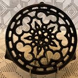 Vintage enameled cast iron trivet