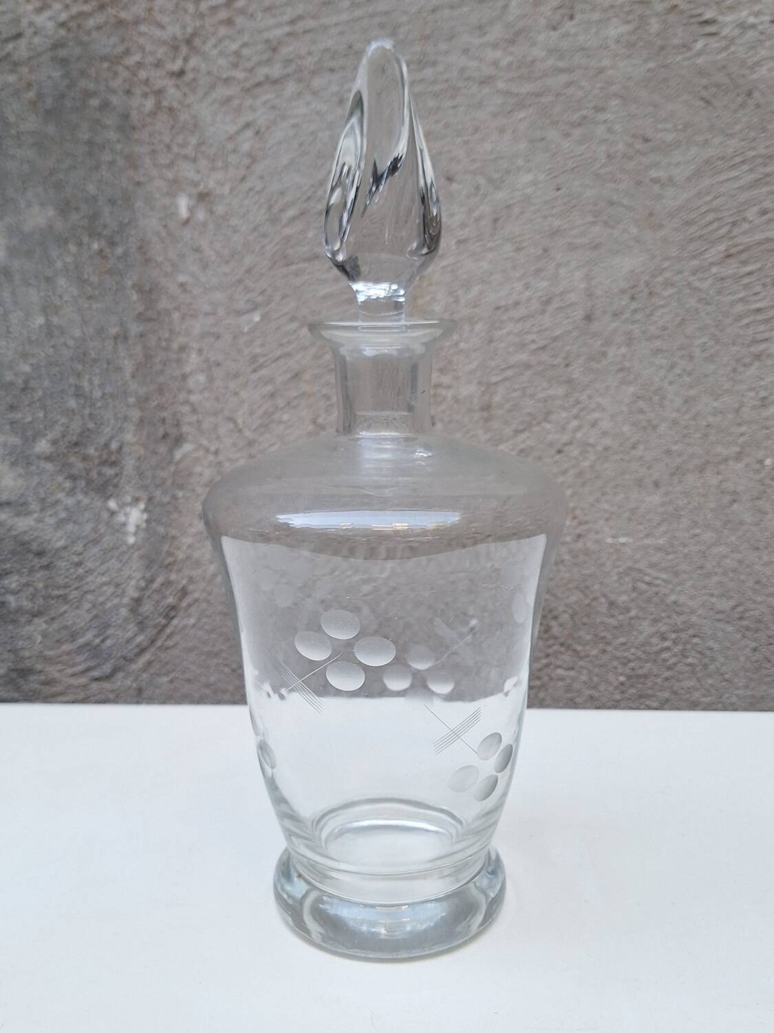 Engraved molded glass carafe from the 1950s