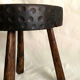 Brutalist tipode stool in carved wood