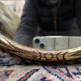 Oval mirror in gilded wood