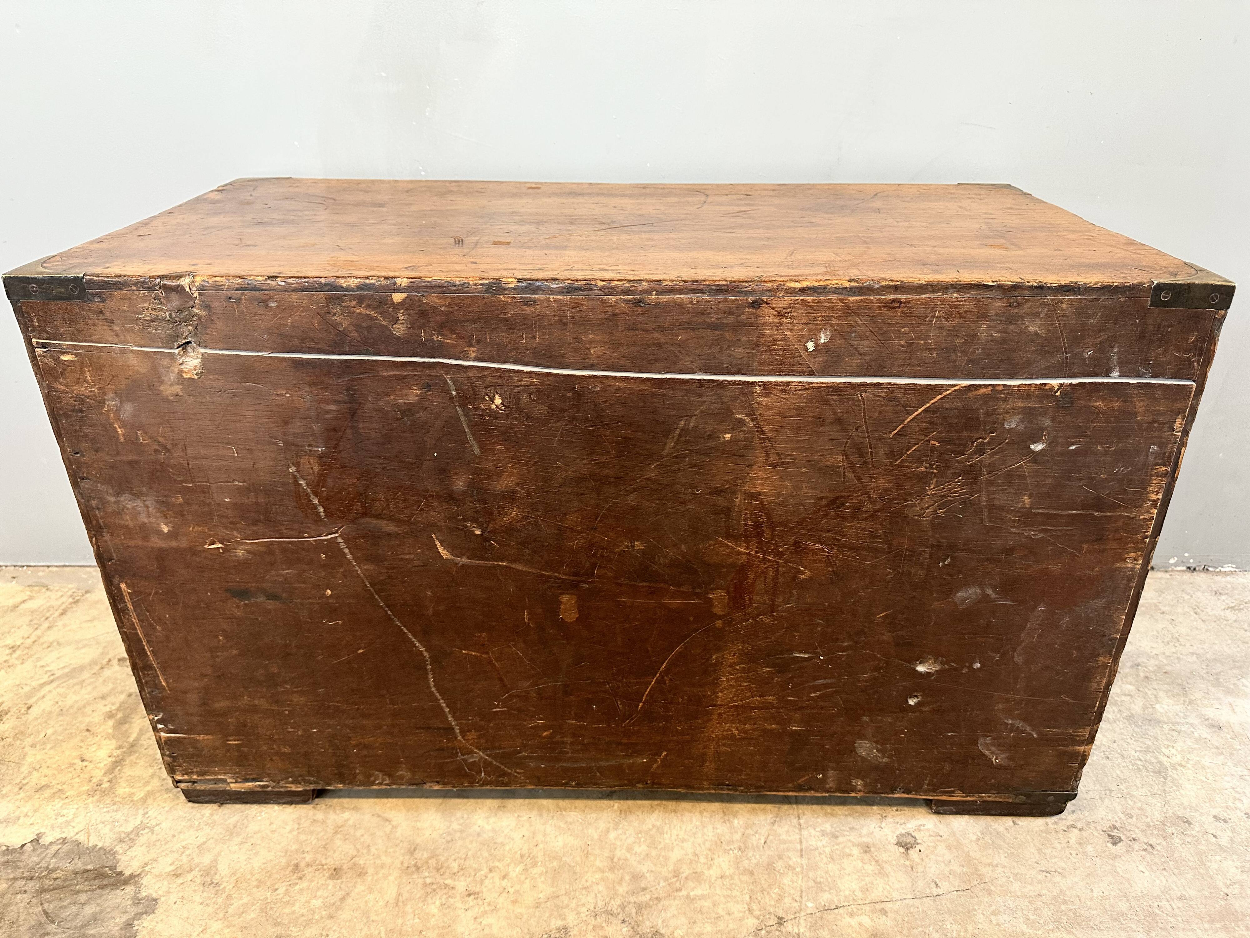 Small marine chest of drawers in wood and brass