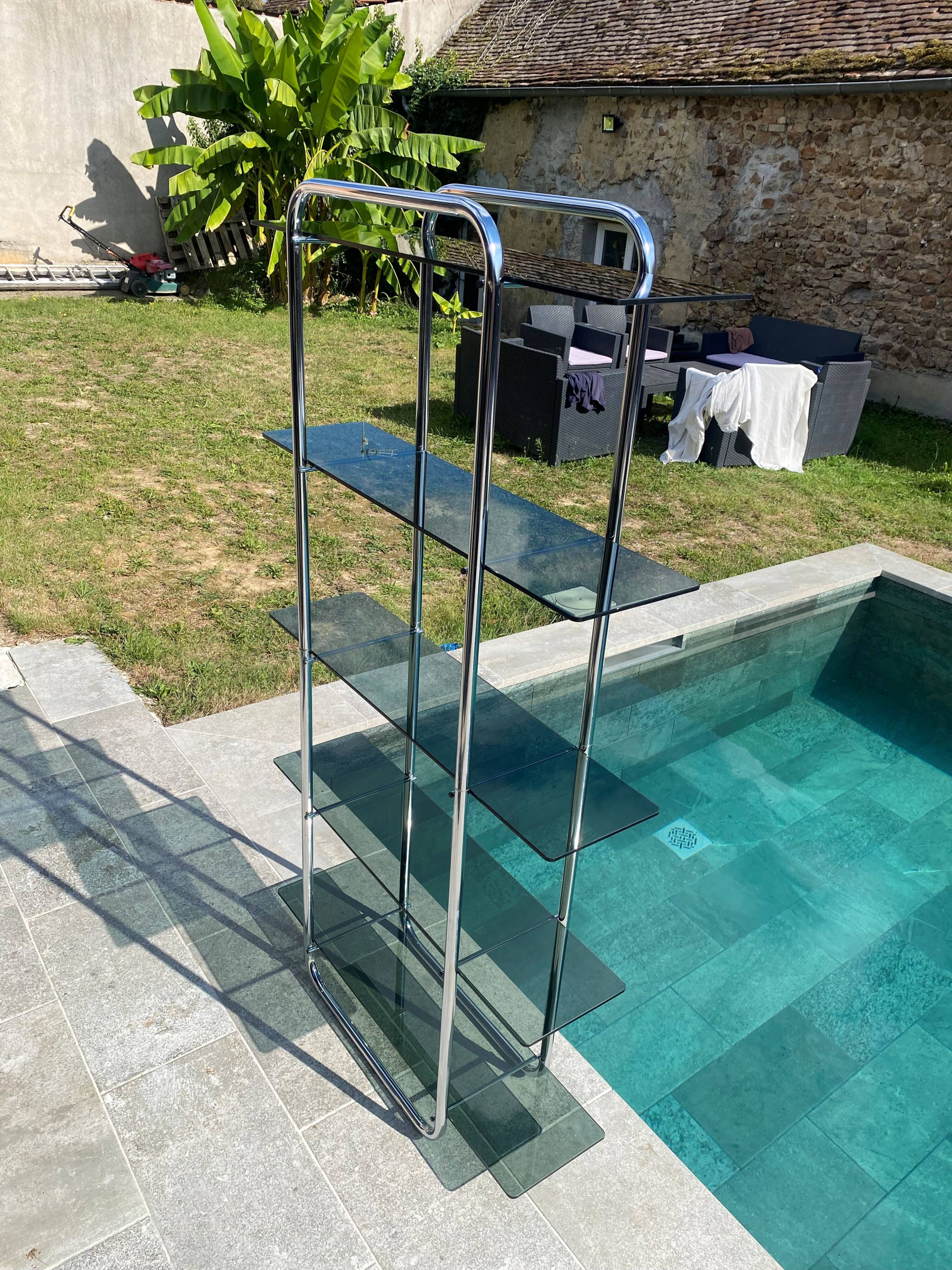 Bauhaus style bookcase with modular wall shelf, glass and chrome