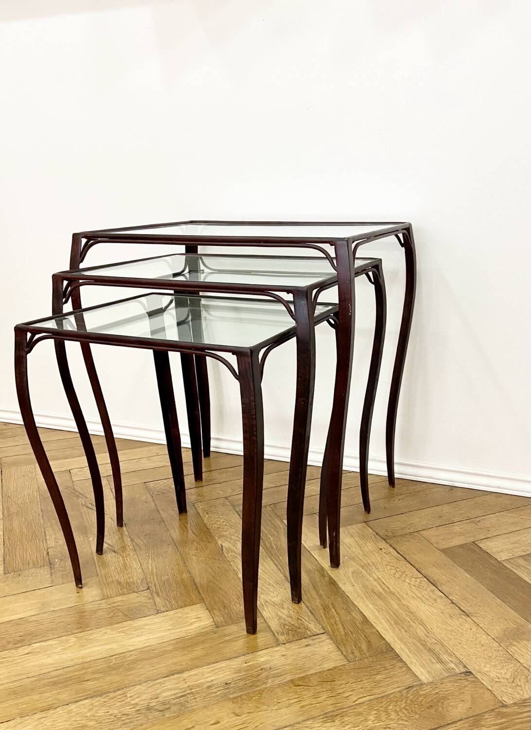 Nesting tables in wrought iron and glass