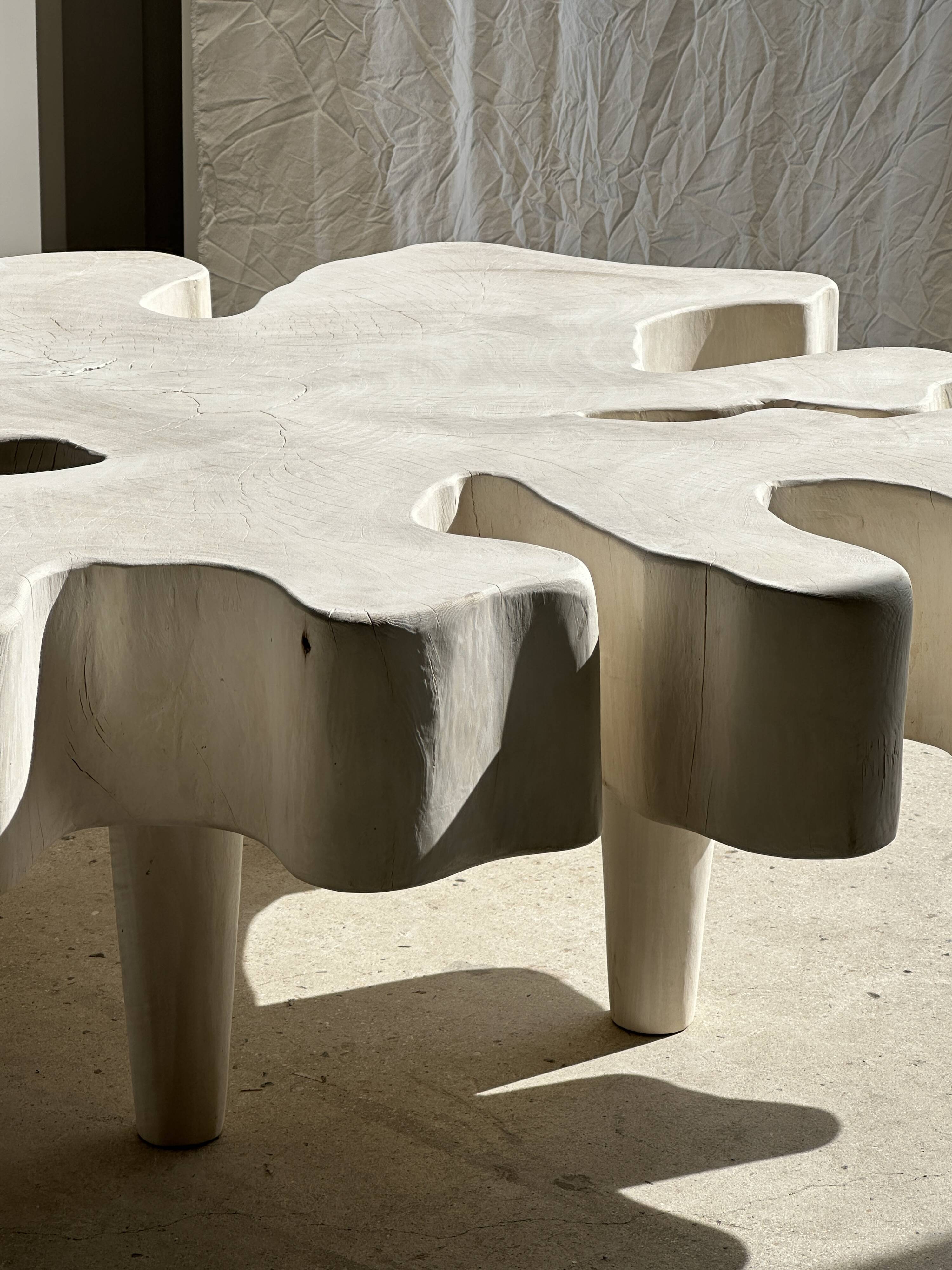 Very large whitewashed mango coffee table with an organic top D:140cm