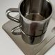 Stainless steel coffee cup set with saucer and spoon – Minimalist Nordic modern design