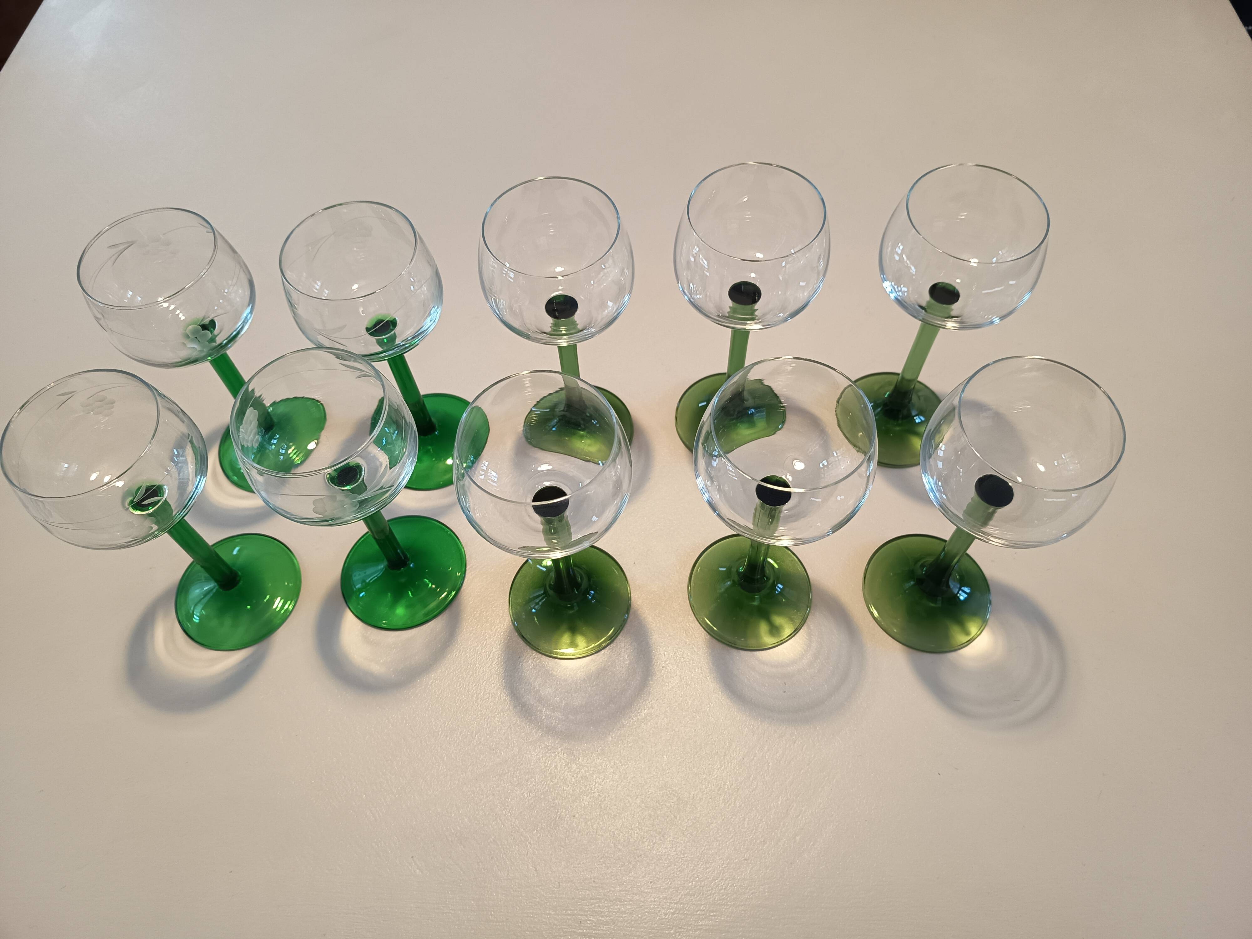 Set of 10 emerald glasses for Alsace wine.