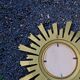 Mid-century style gold resin witch's eye sunburst mirror